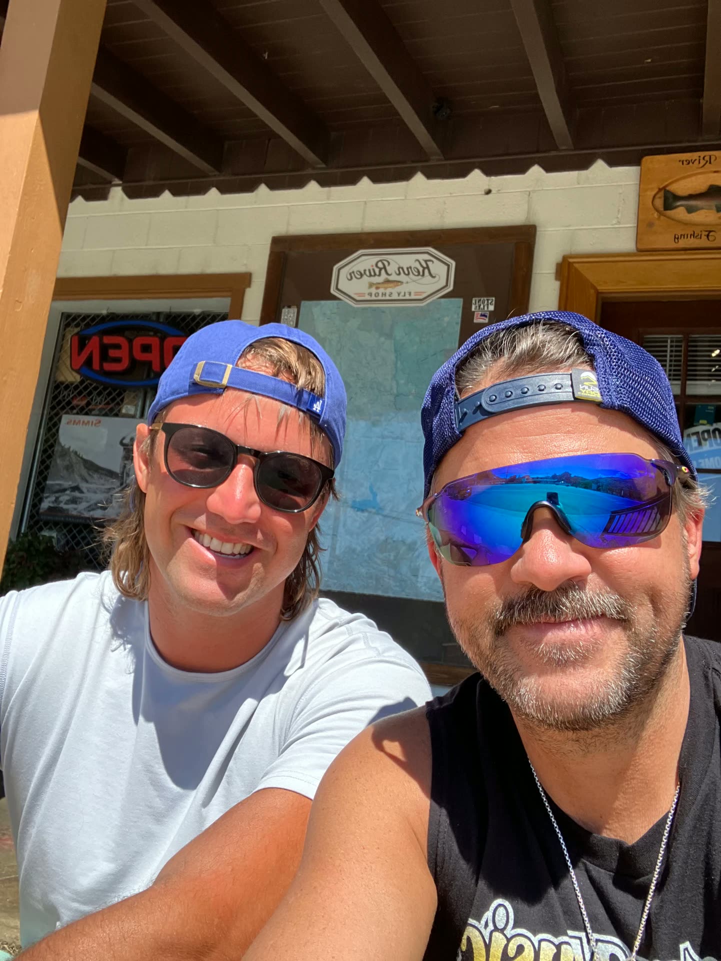 Two men outside the Kern River fly shop before a Recovery Republic fishing trip
