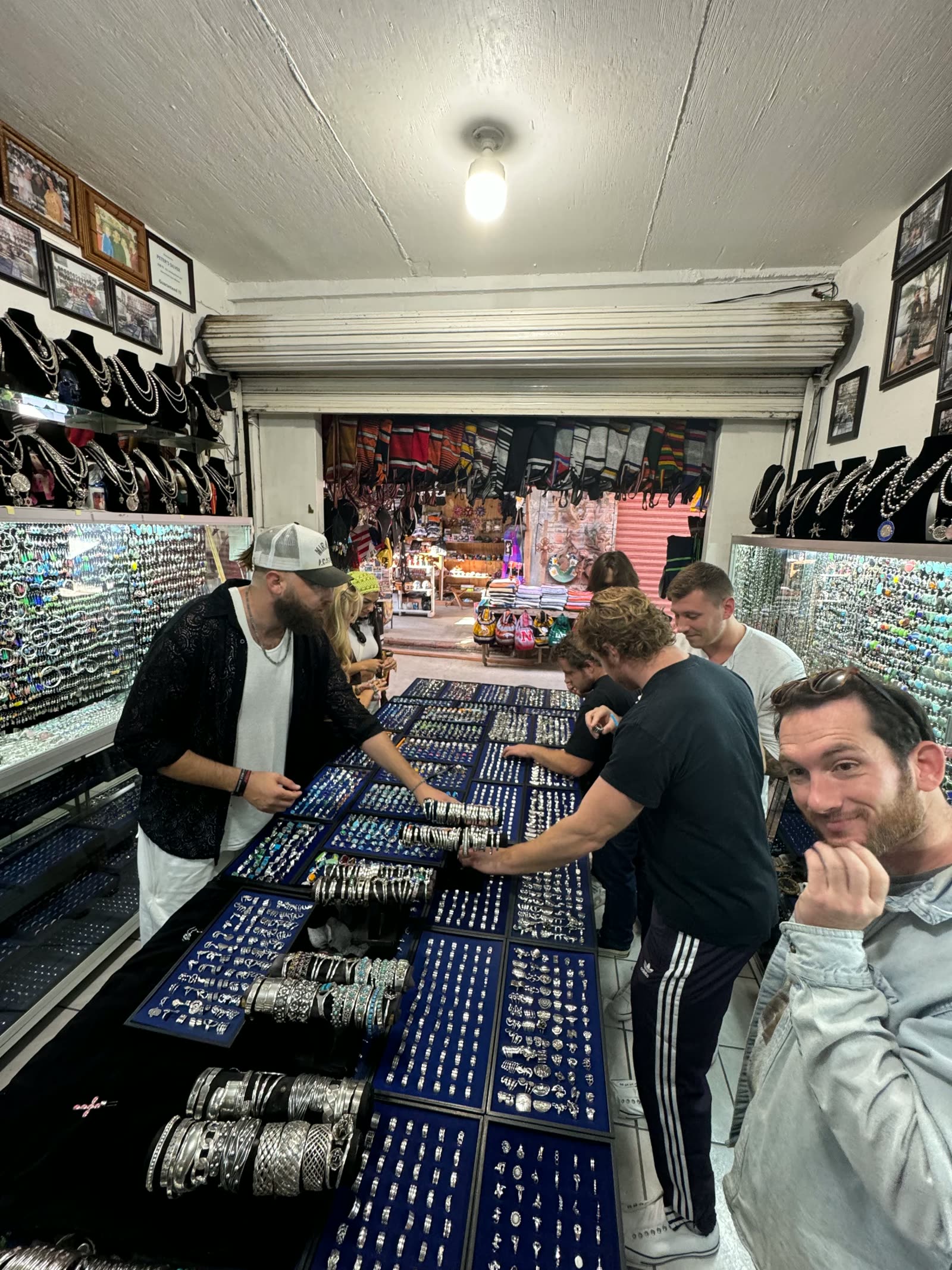 Picking through trays of silver rings at a shop in Baja during an adventure therapy trip