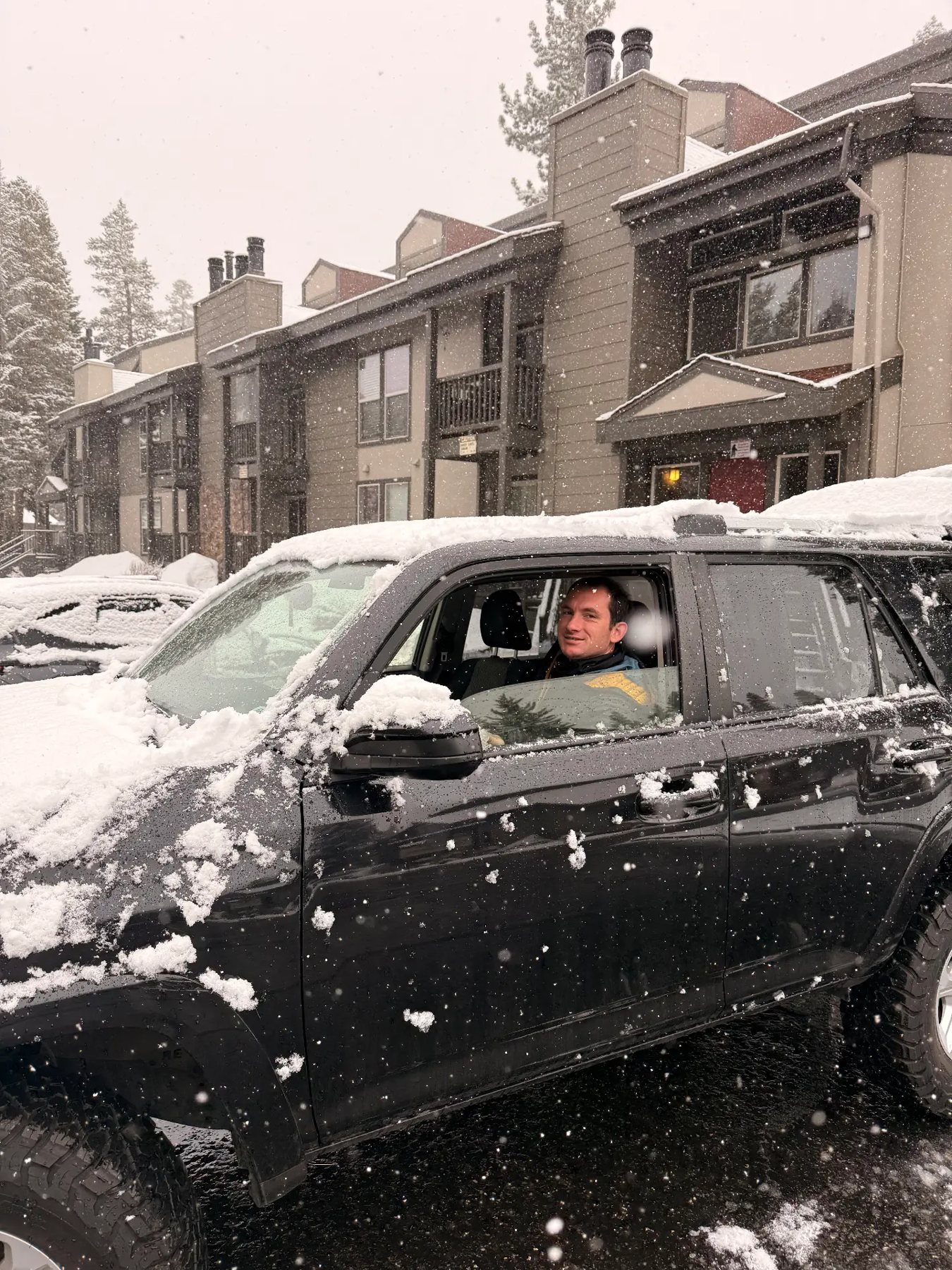 Snow falling on the truck before first chair at Mammoth during a Recovery Republic trip