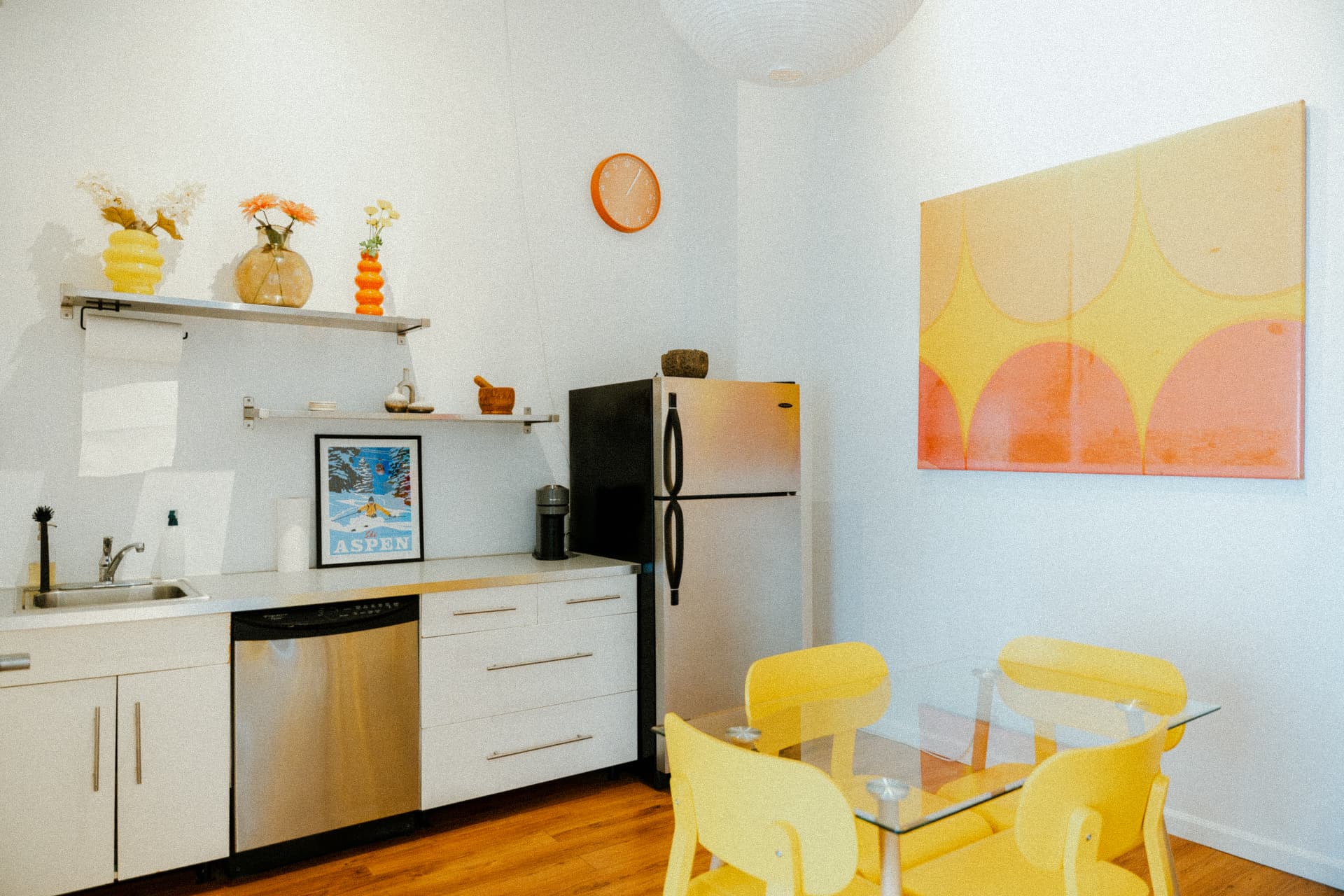 Kitchen counter and dining table in warm light at Recovery Republic, Venice