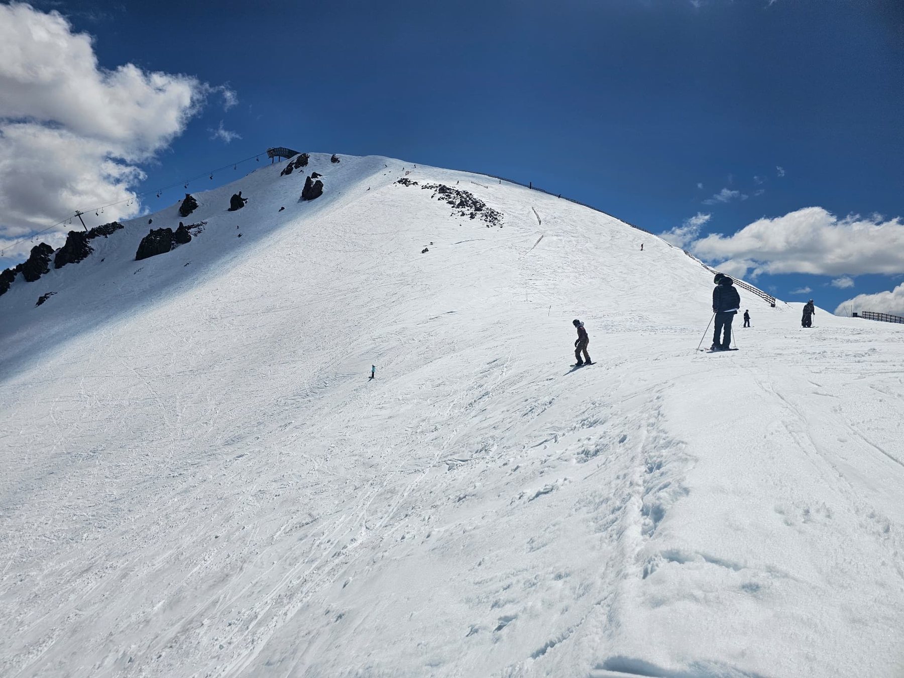 Ridge line at the top of Mammoth under blue sky during a Recovery Republic adventure therapy trip